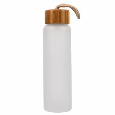 China Outdoor Sports Water Cup Sustainable Simple Office Bamboo Cover Colorful Glass Frosted Or Transparent Portable Glass Bottles for sale