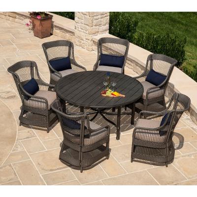 China Contemporary Wholesale Classic Large Patio Outdoor Dining Furniture Set Of Spells Round Table And Rattan Dining Chair for sale