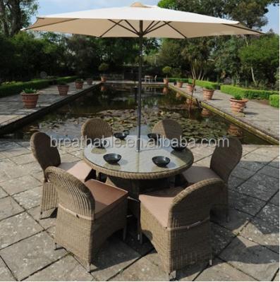 China Contemporary Luxury Style Vintage Hotel Patio Dining Furniture Set Wicker Chair And Outdoor Round Rattan Table for sale