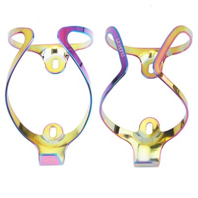 China hot mountain bicycle new product aluminum alloy plating luminous water bottle cage 11.5*7cm for sale