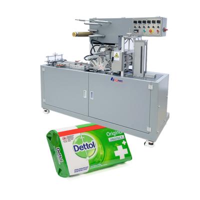 China Food bar soap wrapping machine transparent film packing machine soap wrapping machine cellophane for sale