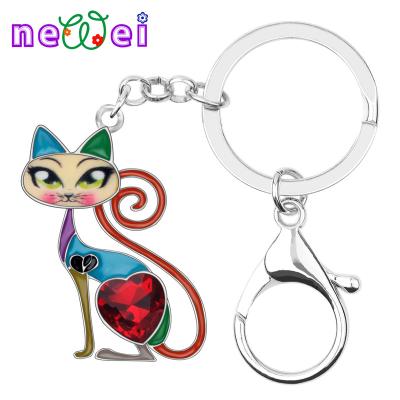 China NEWEI Alloy Enamel Crystal Rhinestone Cats Keychains Kitten Bag Fashionable Car Key Chain Ring Gifts For Women Girls for sale