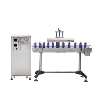 China Small Efficient Sealing SFXB SF-2300 Sealer Aluminum Foil Sealing Machine Bottle Sealer For Packing Production Line for sale