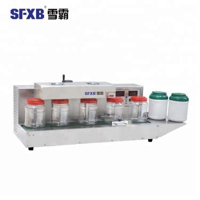 China CLOTHING Automatic Bottle Sealer for sale