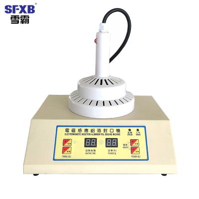 China CLOTHING SFXB Hot Sale Motor Bottle Sealer Induction Aluminum Foil Sealing Machine for sale