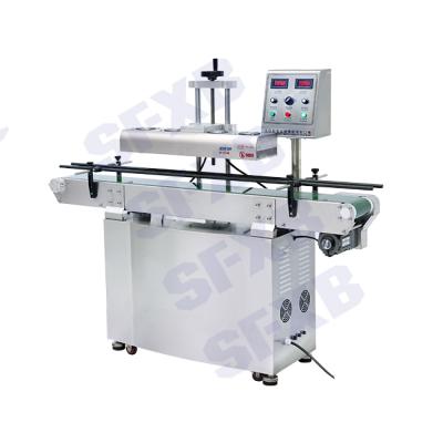 China SFXB SF-2100 High Speed ​​Automatic Food Glass Jar Capsule Induction Sealer Aluminum Foil Sealing Machine for sale