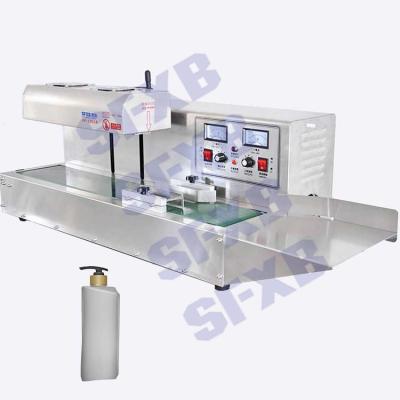 China SFXB SF-1300 Continuous Food Closing Bottles Aluminum Foil Induction Sealing Machine for sale