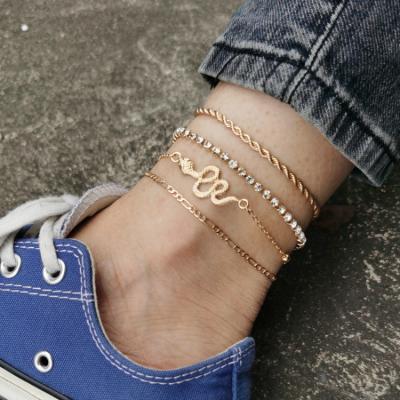 China Hot Selling High Quality Charm Fashion Gold Rhinestones Bling Gold Plated Animal Cuban Anklet Snake Anklet Couples Foot Jewelry for sale