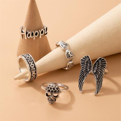 China Environmental Friendly Halloween Ring Retro Wings Grin HAPPY Letter Ring 5 Pieces Set Holiday Custom Ring Set For Girls for sale