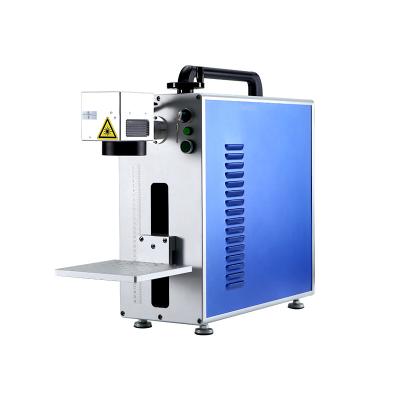 China Air-cooled portable type fiber optic laser marking machine (computer optional) for sale