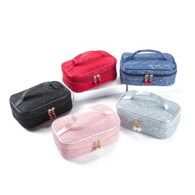 China Lady Wholesale Ladies Lace Makeup Organizer Bag Elegant Cosmetic Floral Bag Beauty Cosmetic Toiletries Bag for sale