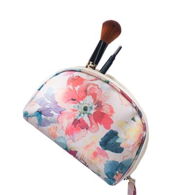 China Mini Makeup Pouch Bag Half Moon Shape Handbag Shell Lipstick Pouch Universal Wholesale Cosmetic Pouch Bag for sale