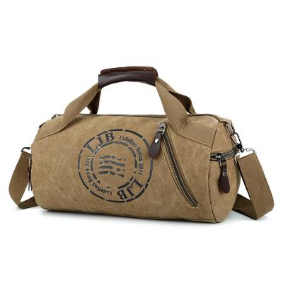 China Universal Custom Round Waxed Canvas Duffel Bag Mens Travel Weekender Bag With Shoulder Strap for sale