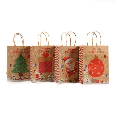 China Kraft Paper Bags 2021 Wholesale Merry Christmas Kraft Paper Bag Kids Craft Candy Bag Christmas Tree Gift Bags for sale