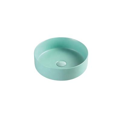 China Modern Design Modern Matte Slim Rim Color Round Countertop Mounted Hand Sink for sale