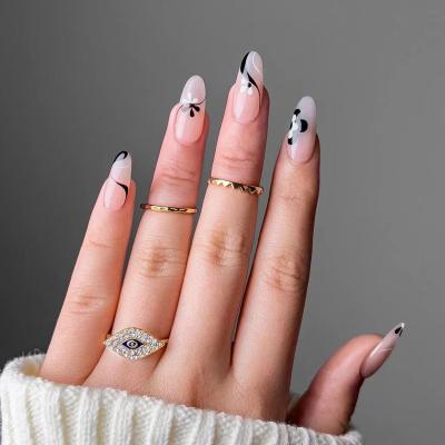 China Easy Apply New Variety 24pcs 2022 Global Hot Selling French Black Line Styles Almond Flower Artificial Nails for sale