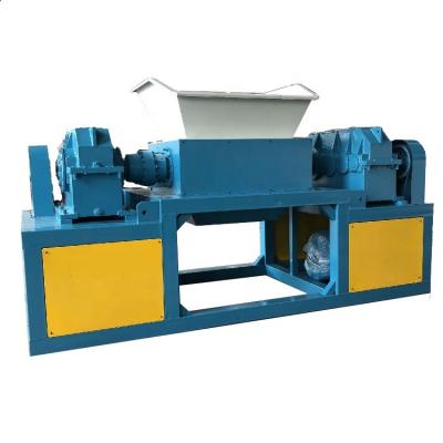 China Multifunctional Double Shaft Junked Tire Shredder Hotels Metal And Plastic Shredding for sale