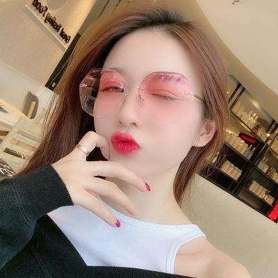 China New Fashion Sunglasses Women Round Frame Crystal Rimless Sunglasses Trendy Korean Fashion Women's Sunglasses for sale