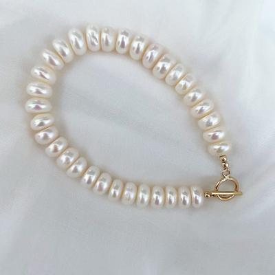 China Bracelets Wholesale Natural Flat Simple Fashion Freshwater Barlock Pearl 6-7mm Handmade Beaded String Bracelet Natural for sale