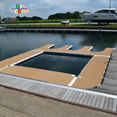 China 5X3m PVC Drop Stitch Teak Foam Wood Grain Motorboat Station Sea Scooter E Shape Inflatable Jet Ski Dock for sale