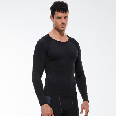 China Quick-drying Fitness Stretch Suits Sweat-wicking Breathable Men's Jogging Sportswear Tight Training T-shirt Long Sleeve Breathable for sale