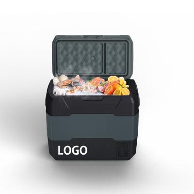 China 2023 New Style ABS 2023 New Style Luggage Design 55L Portable Car Fridge Low Noise Quick Cooling Freezer for sale