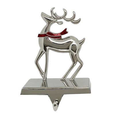 China Wholesale Custom Christmas Day Decoratiom Festival Decorative Christmas Decor Supplies 3D Reindeer Christmas Metal Cast Silver Standing Stocking Holder for sale