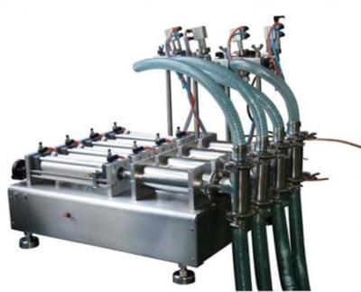 China High efficiency 4 heads piston liquid filler/pneumatic filling machine en venta