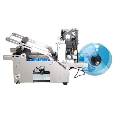 China Best price MT-50 manual bottle label applicator machine/wine bottle labeling machine for circle bottle for sale