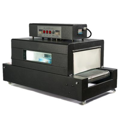 China Heat tunnel shrink wrapping machine heat shrink film machine for sale