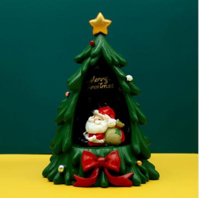 China Synthetic Resin Santa Claus Night Light Creative Resin Star Lamp Ornaments Desktop Decoration for sale