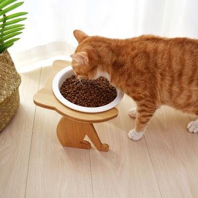 China Home Decor Personalize Pet Driver Cat Shape Wood Stand Raised Neck Guard Ceramic Pet Food Bowl for sale