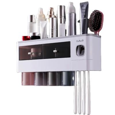 China Disposable Wall Mounted Automatic Multi-Function Holder Toothpaste Dispenser Toothpaste Factory Magnetic Adsorption Also for sale