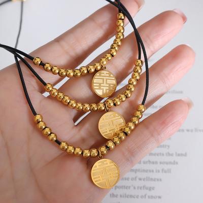 China 2022 New Vintage 18k Gold Stainless Steel Minimalist Personality Design Blessing Around Brand Steel Ball Leather Rope Necklace for sale