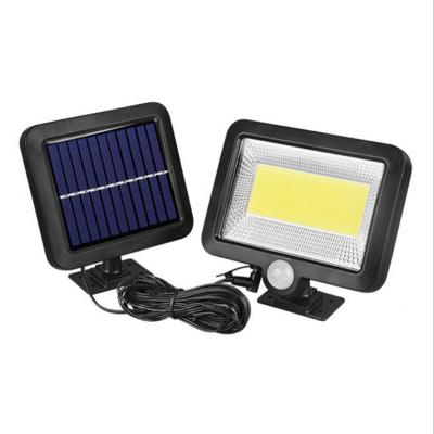 China Outdoor Garden 56 LED Solar Power Motion Sensor Floodlight 100COB Security Emergency Sensor Split LED Solar Wall Light for sale