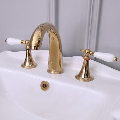 China Antique Style Metered Faucets Double Handle 3 Hole Brass Basin Faucet Mixer Tap for sale