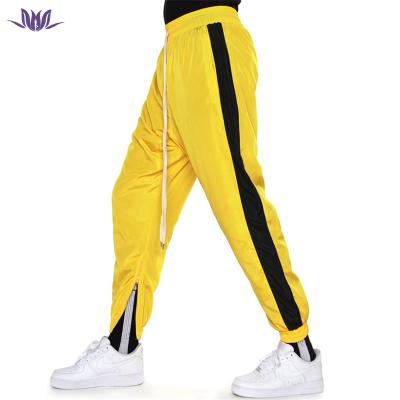 China Bulk Men's Anti-Wrinkle Shopping Clothing Anorak Alley Pant Side Bars Streetwear Private Label Sweatpants for sale