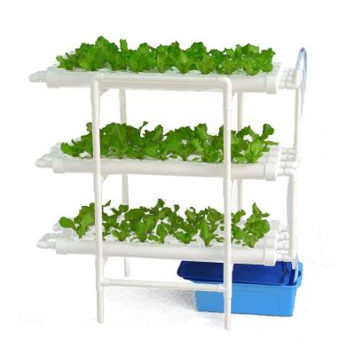 China High Quality Indoor Farms Safety NFT Hydroponic System With 108 Holes PVC Pipes Greenhouses Structure With Hydroponic System for sale