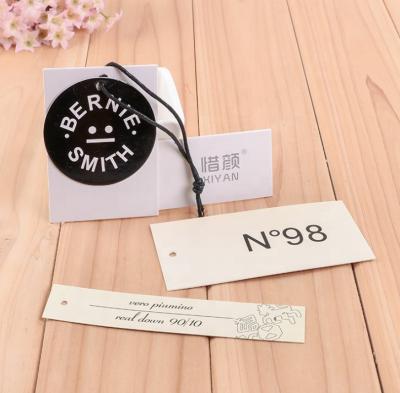 China Custom Logo New Design Custom Clothing Hang Tags Swing Tag For Clothes for sale