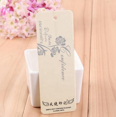 China Custom Recycled Paper Hang Tag Garment Tag For Clothing for sale