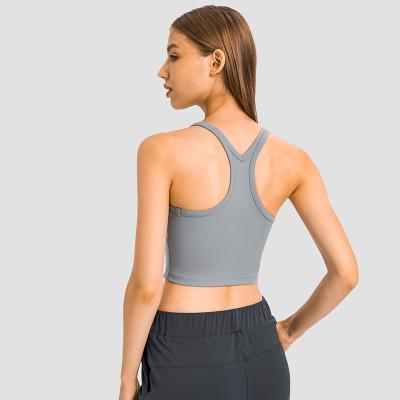 China Women Support Soft Skin Feel Yoga Ultra High Strappy QUICK DRY Compression Padded Tank Tops Running Fitness Sports Bra for sale