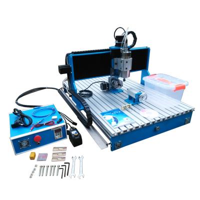 China LY 6090 1.5KW 4 Axis USB Port Guide Rail CNC Router Linear Engraver Drilling Machinery Repair Shops and Milling Machine for sale