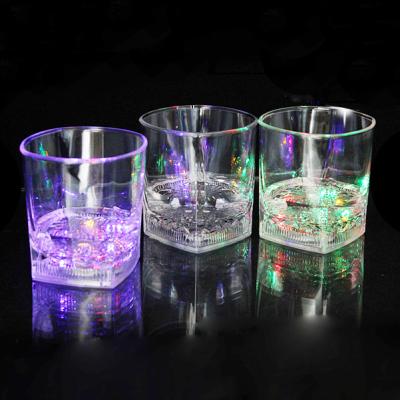 China Transparent Party Flashing Light Multicolor Liquid Water Activated Cube Mug 7oz LED Cup For Party for sale