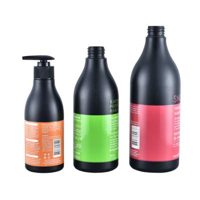 China Personal Care 300ml /500ml/ 800ml Round Black PE Plastic Cosmetics Lotion Bottle With Pump for sale