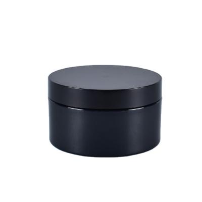 China Personal Care Reusable Cosmetic Package Container 80ml Solid Black Plastic Jar With Black Lid for sale