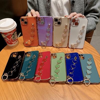 China Luxury Plating Anti-fall Heart Bracelet Phone Chain Case For Iphone 13 Pro Max for sale