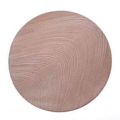 China Sustainable Round Irregular Textured Cavity Western Table Mat PVC Solid Color Tanning Waterproof Table Mat for sale