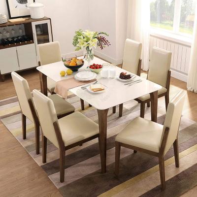 China Modern Furniture Silver Extendable Dinner Room Table And Chairs Glass Top Dining Table Set Transparent OEM Tempered Metal Hardware for sale