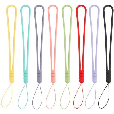 China Anti Lost Hand Strap Cell Phone Silicone Wrist Strap Mobile Phone Wrist Lanyard Safety String Lost Short Soft Hand Holder For Mobile Phone for sale