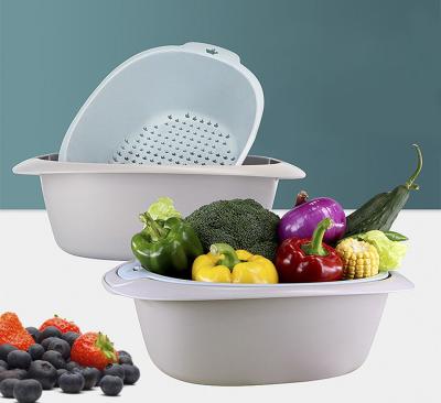 China Sustainable Double Layer Kitchen Plastic Fruit Vegetables Shaped Sink Basket Colander Wash Sieve for sale